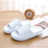 Men's cloud slippers; shower slippers in home bathroom