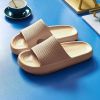Men's cloud slippers; shower slippers in home bathroom